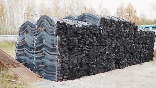 Stacks of geogrid on pallets on the stock of the plant. — Stock Video