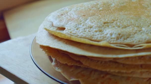 Yummy yellow pancake stack on glass plate. Home cooking steam. Slowmo closeup. — Stock Video