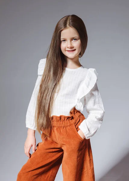 Portrait of little model girl in studio — Stock Photo, Image