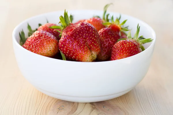 Strawberries in the white bowl — Stock Photo, Image