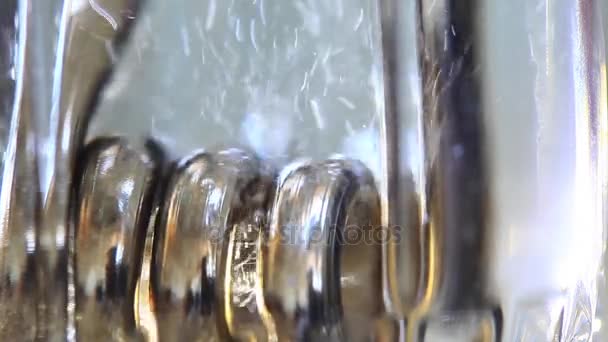 Glass of clear water with kettle — Stock Video