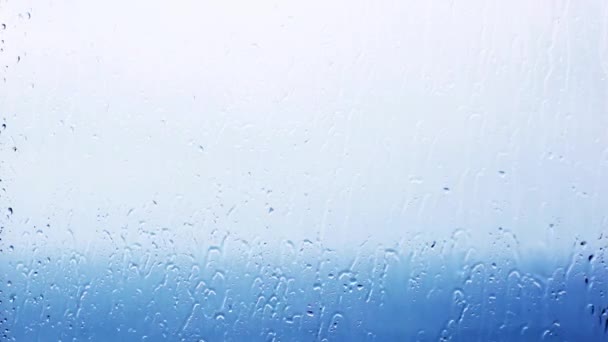 Gotas de agua en vidrio de ventana — Vídeo de stock