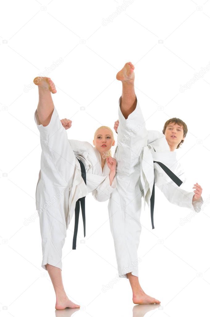 Strong young blonde girl and the saucy karate guy