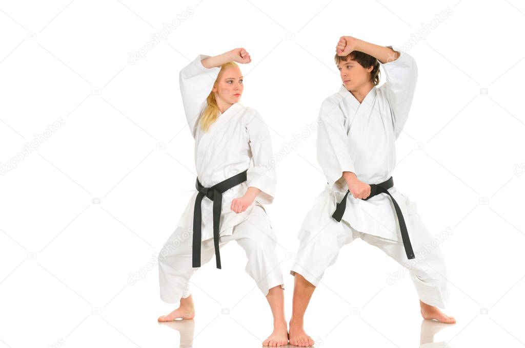 Strong blonde girl and the impudent karate guy