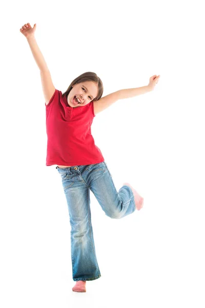 Happy child posing standing on one leg Royalty Free Stock Photos