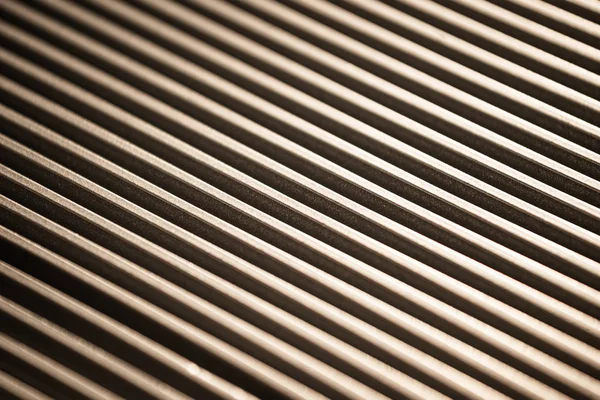 Primo piano di una superficie metallica ondulata — Foto Stock