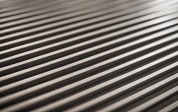 Close-up of an iron corrugated surface of a device — Stock Photo, Image