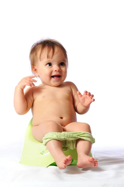 Potty training of adorable baby