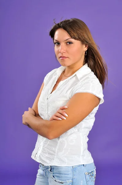 Standing woman looking at camera — Stock Photo, Image