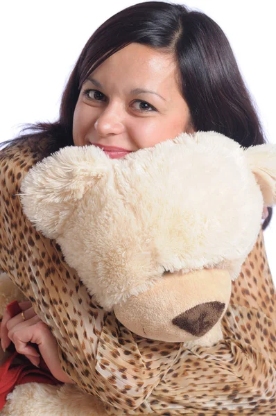 Mujer abrazando gran luz peluche oso —  Fotos de Stock