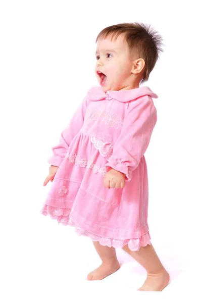 Baby in pink dress screaming out loud — Stock Photo, Image