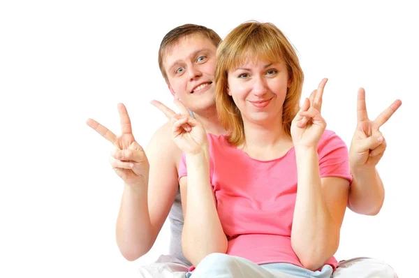 Couple de parents montrent geste gros doigts — Photo