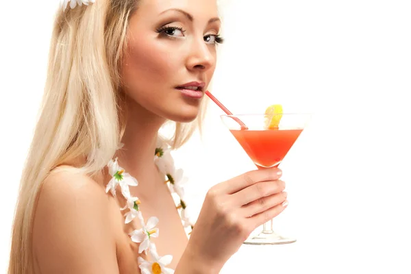 Blond woman in costume made from chamomile flowers holding cocktail in glass — Stock Photo, Image