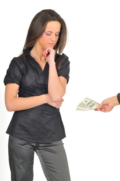 Woman looking at dollar bills in hand — Stock Photo, Image
