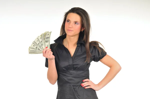 Kobieta trzyma w rękach banknoty dolarowe — Zdjęcie stockowe