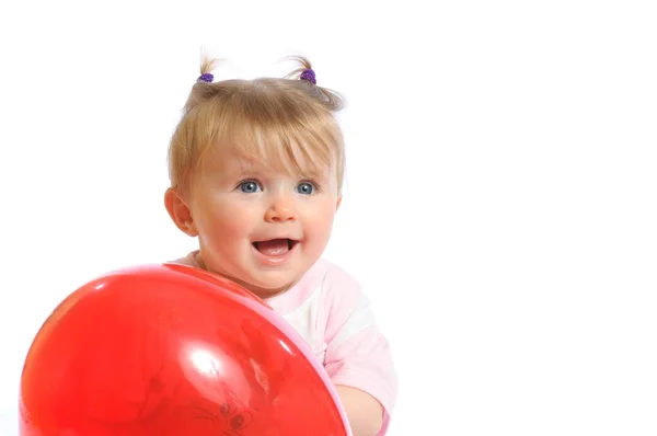 Little girl holding red balloon — ストック写真