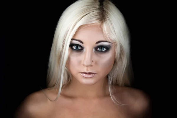 Young blonde woman face with dark makeup — Stock Photo, Image