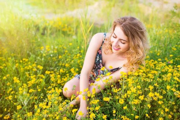 Nice young beautiful girl in a dress — Stock Photo, Image