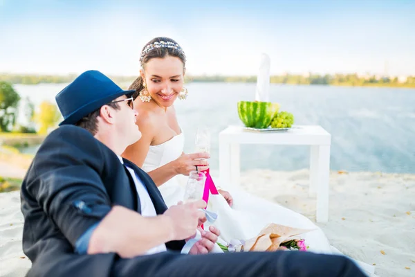 Side view of charming young couple bride and groom — Stock Photo, Image