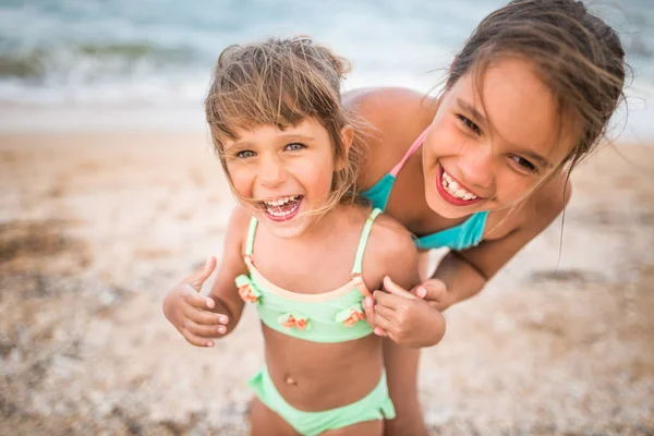 Two cute positive little girls sisters — Stock Photo, Image