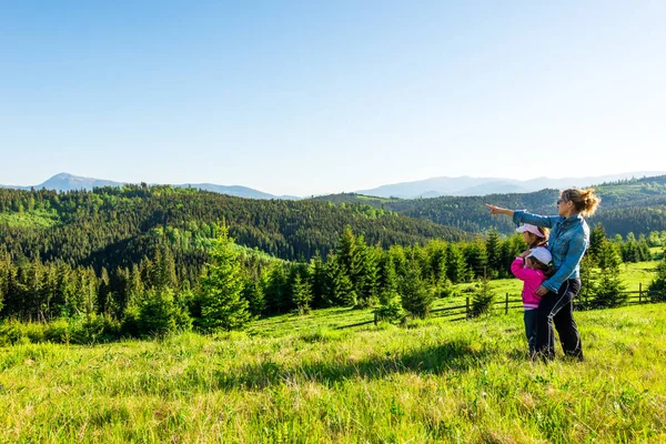 Young mother and two little daughters travelers Stock Image