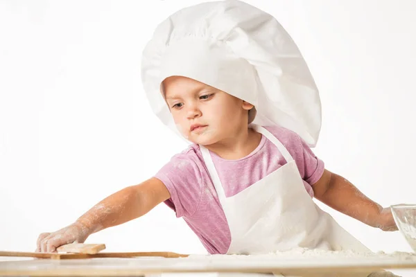 Portrait of a cute little child in a chef's hat — Stock Photo, Image