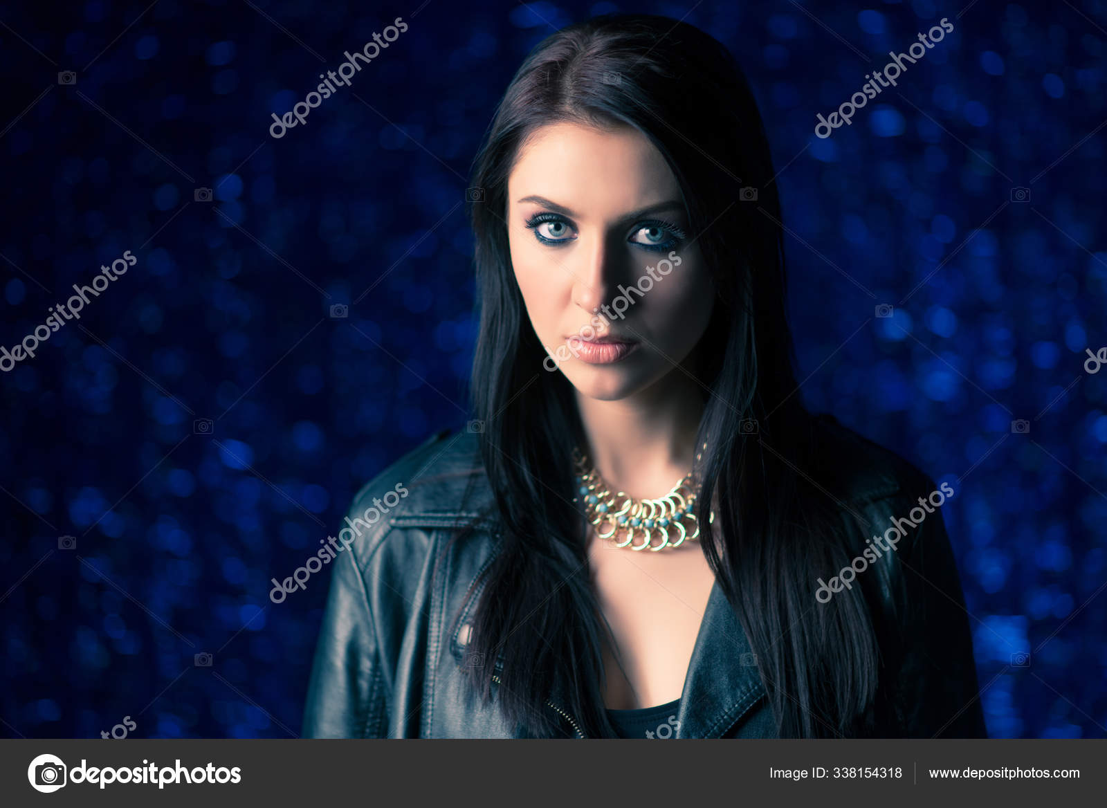 Cute young attractive girl to a leather jacket Stock Photo by ©YouraPechkin@gmail 338154318 image