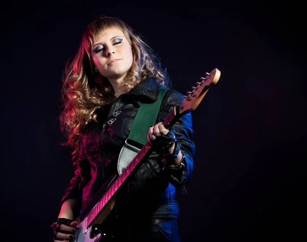 Girl with blond hair playing guitar — Stock Photo, Image