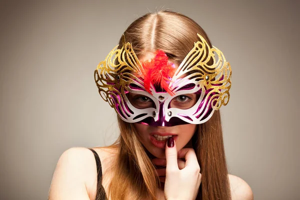 Woman in large multicolored carnival mask — Stok fotoğraf