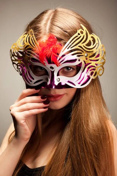 Woman in large multicolored carnival mask — Stock Photo, Image