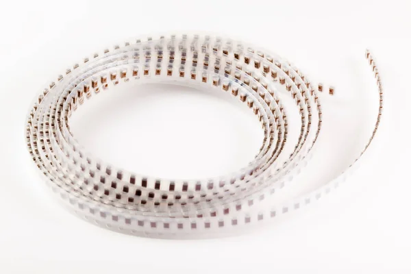 Plastic tape with capacitors electronic devices — 스톡 사진