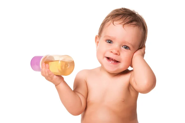 Lindo niño sosteniendo fórmula de bebé . —  Fotos de Stock