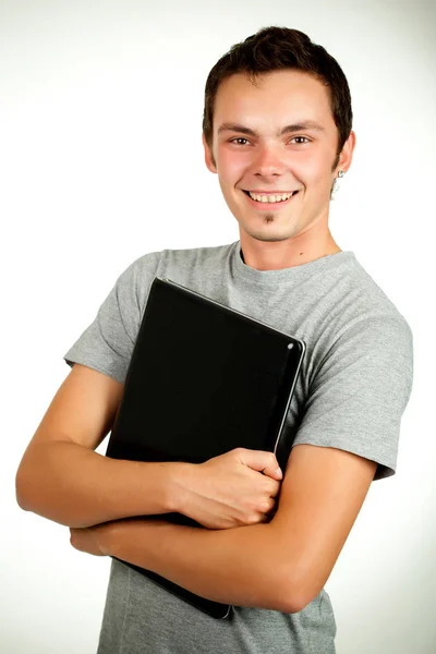 Portrait of a positive pretty young student Stock Picture