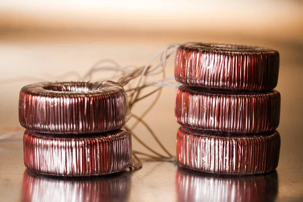 Close-up round transformer wrapped in wire