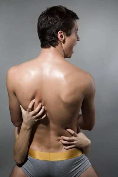 Rear view of a young sporty man — Stock Photo, Image