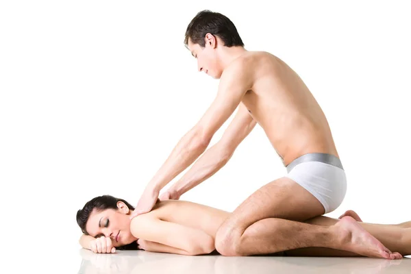 Man doing neck massage to girl — Stock Photo, Image