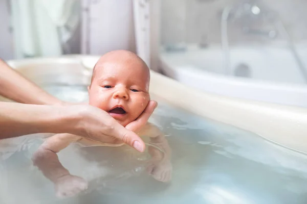 Small Cute Big Eyed Beautiful Baby Bathes Warm Water Hands — Stock Photo, Image