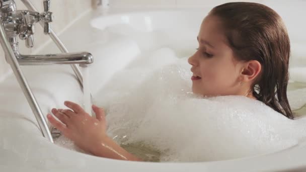 Little Girl Bathes Bathtub Plays Foam Hygiene Baby Care Concept — Stock Video
