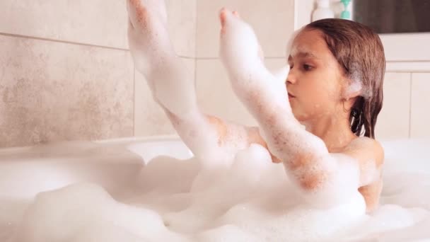 Little Girl Bathes Bathtub Plays Foam Hygiene Baby Care Concept — Stock Video