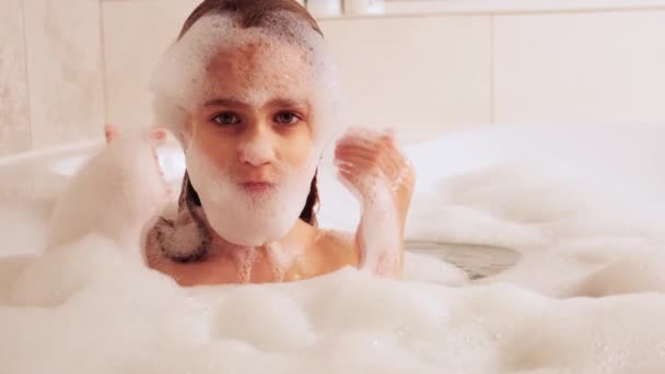 Little Girl Bathes Bathtub Plays Foam Hygiene Baby Care Concept — Stock Video