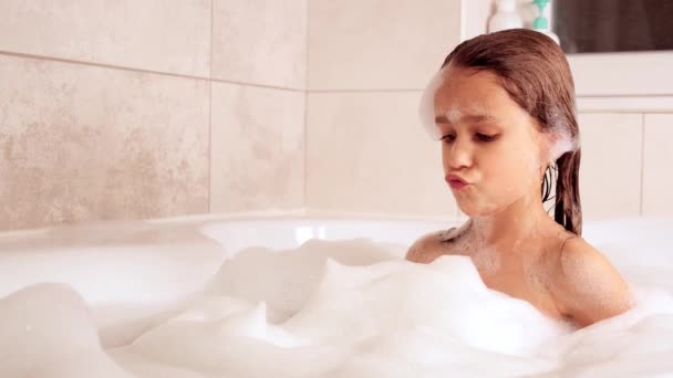 Little Girl Bathes Bathtub Plays Foam Hygiene Baby Care Concept — Stock Video