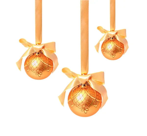 Hunging golden christmas balls isolated on a white — Stock Photo, Image