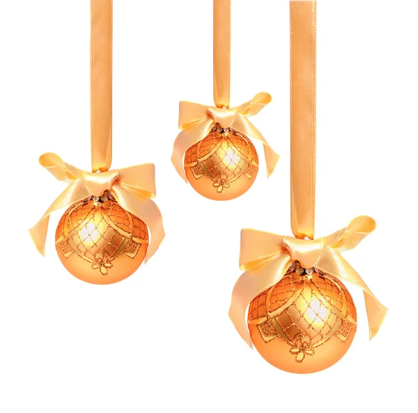 Hunging golden christmas balls isolated — Stock Photo, Image