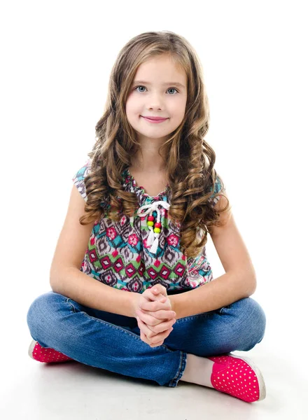 Adorable smiling  little girl sitting on a floor — Stock Photo, Image