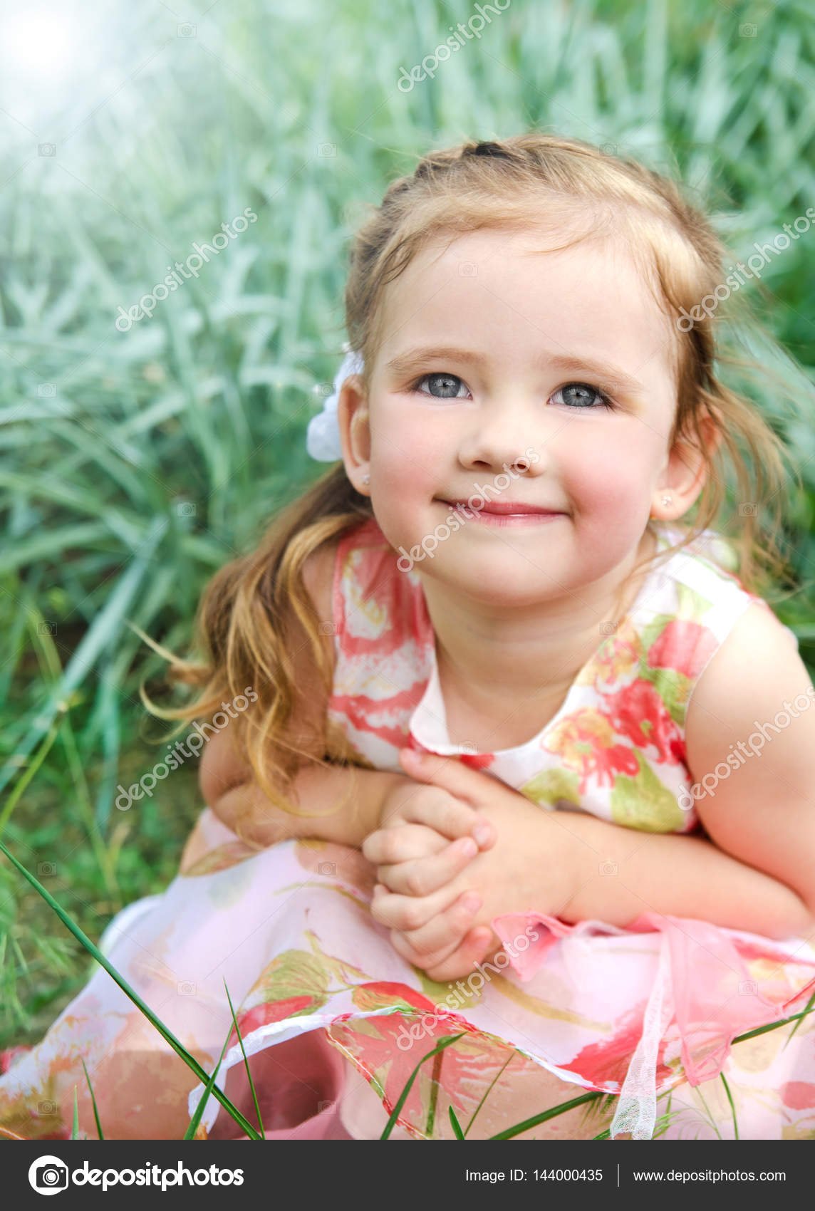 Portrait Of Smiling Cute Little Girl In Princess Dress Stock
