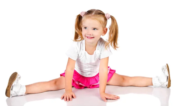 Portrait of cute sitting smiling little girl — Stock Photo, Image