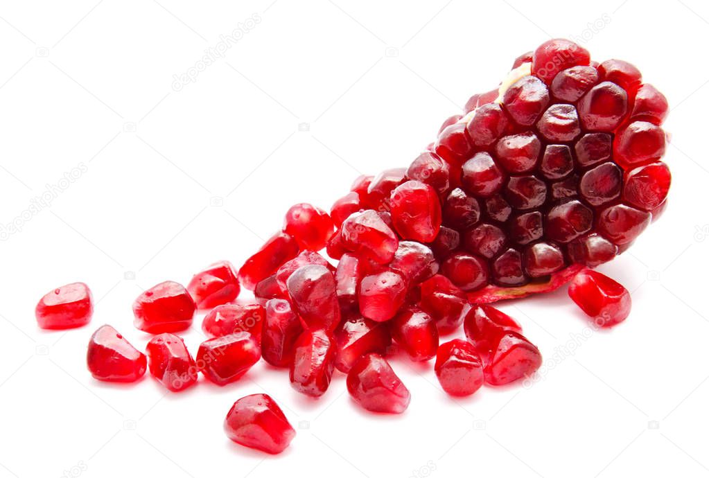 Ripe pomegranate fruit isolated on a white