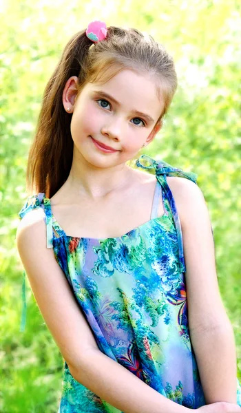 Portrait of adorable smiling little girl outdoor — Stock Photo, Image