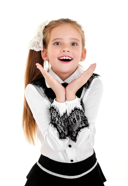 Překvapený šťastný školní dítě dívka v uniformě, samostatný — Stock fotografie