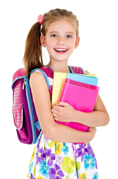 Portret uśmiechniętej uczennicy z torbą szkolną i książkami — Zdjęcie stockowe